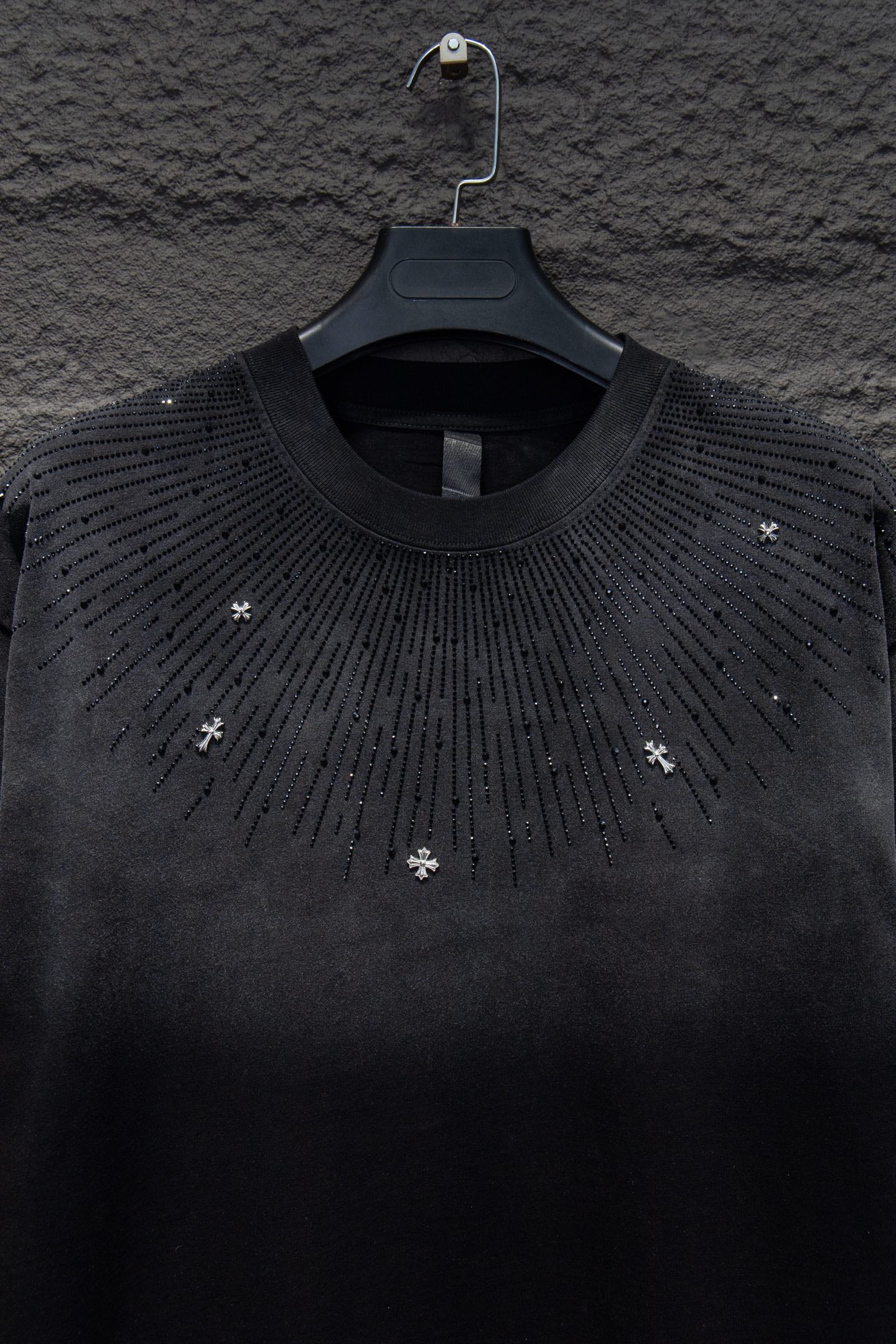 Chrome short-sleeve top, black knit with crystal-like star cross studs