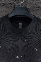 Chrome short-sleeve top neckline, black knit with studded drip pattern