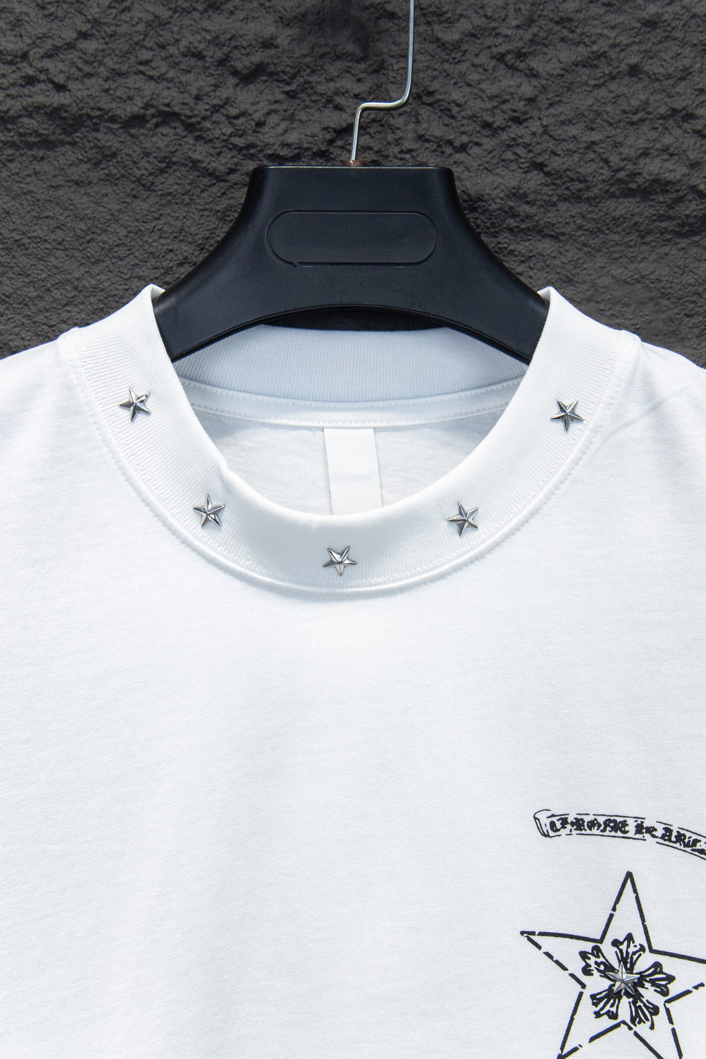 White crewneck T-shirt with star stud graphic and printed collar logo