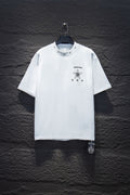 White short-sleeve crewneck T-shirt with small star and crest graphic on chest