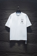White short-sleeve crewneck T-shirt with small star and crest graphic on chest