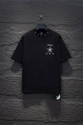 Black short-sleeve T-shirt with small chest star and logo graphic