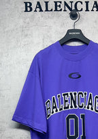 Purple T-shirt close-up of BALENCIAGA text and '01' print