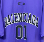 Purple T-shirt close-up of BALENCIAGA lettering and '01' number