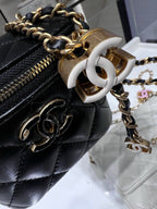 Chanel quilted leather mini bag with gold chain strap and large CC turn-lock clasp, black