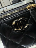 Chanel quilted leather mini bag, black with gold-tone CC logo and zipper