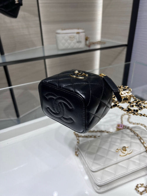 Chanel quilted leather mini bag with gold chain strap and top flap, black