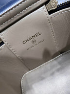 Chanel leather bag patch reading CHANEL and MADE IN ITALY, beige