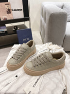 Unisex low-top sneakers in light gray-beige with lace-up, Dior logo patches