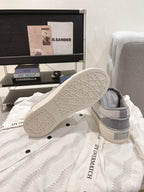 Gray Dior unisex sneakers with perforated outsole pattern and off-white tread