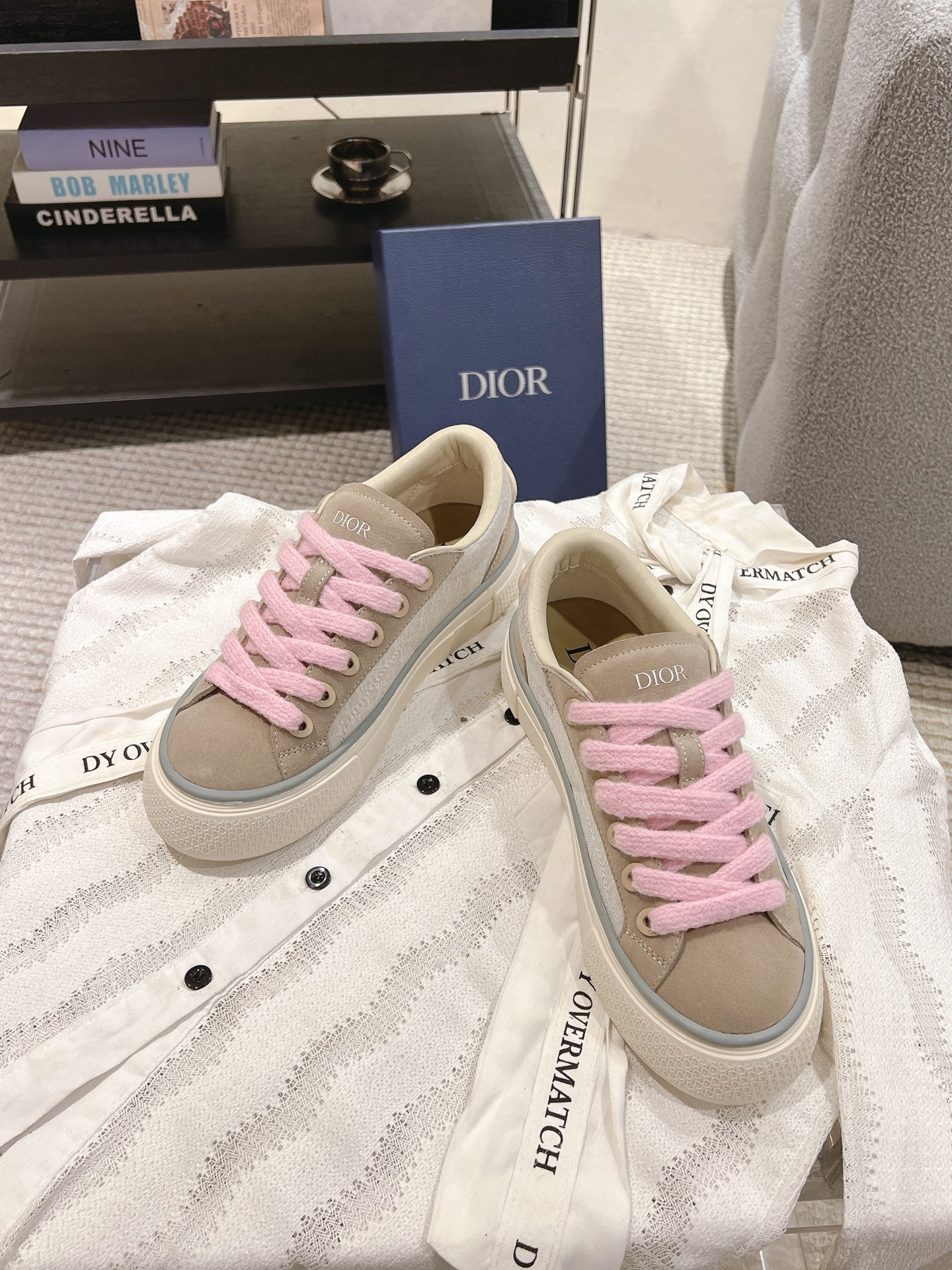 Low-top sneakers in light beige with pink laces, white sole, DIOR logo on tongue