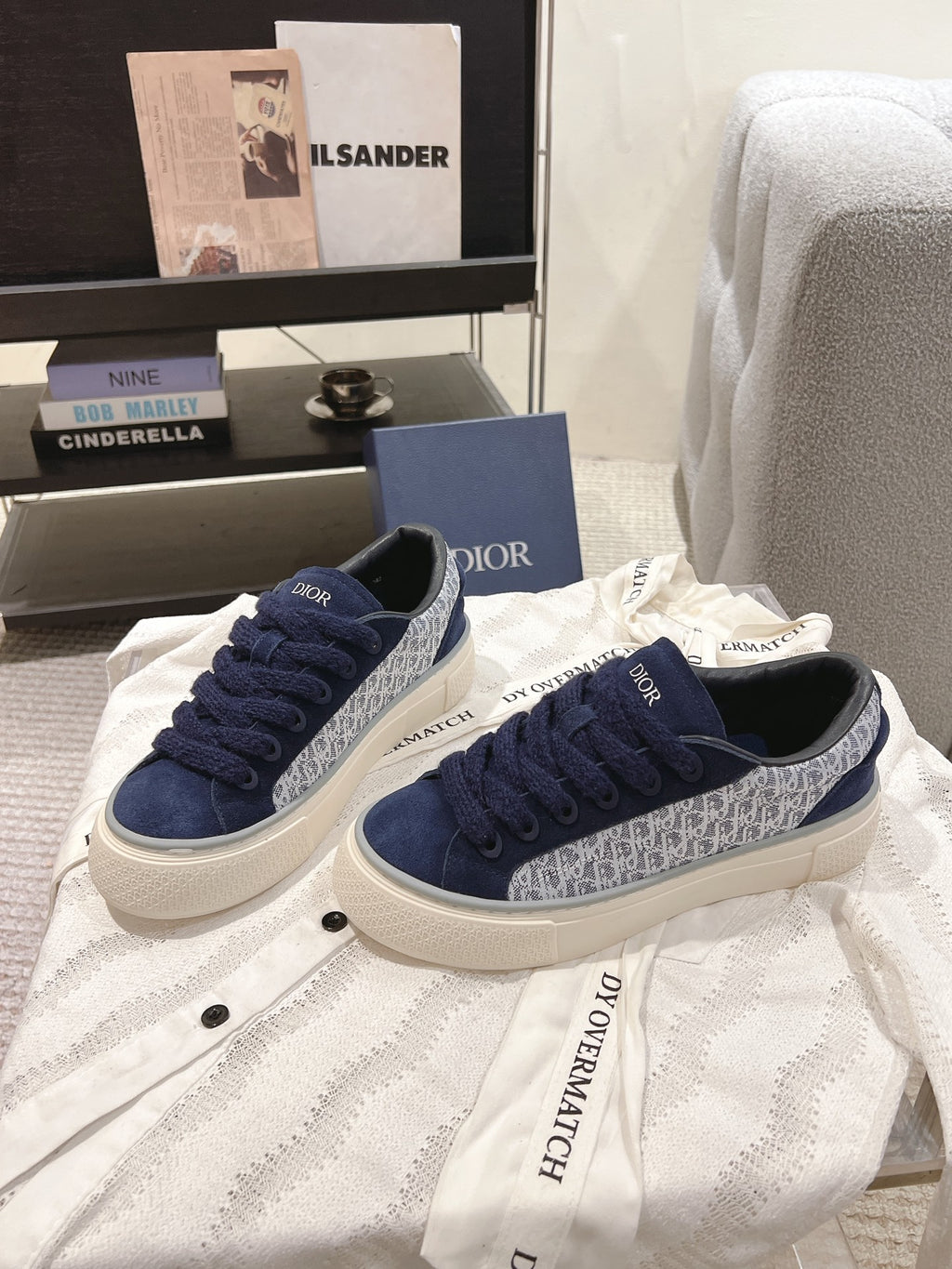 Blue Dior patterned lace-up sneakers with white toe and rubber sole