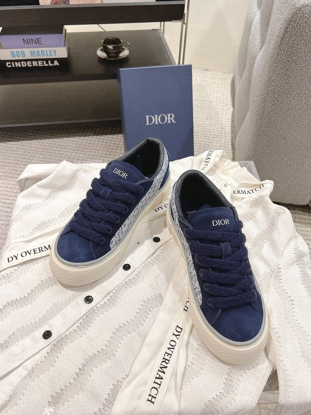 Navy Dior low-top sneakers with fabric laces and white rubber sole
