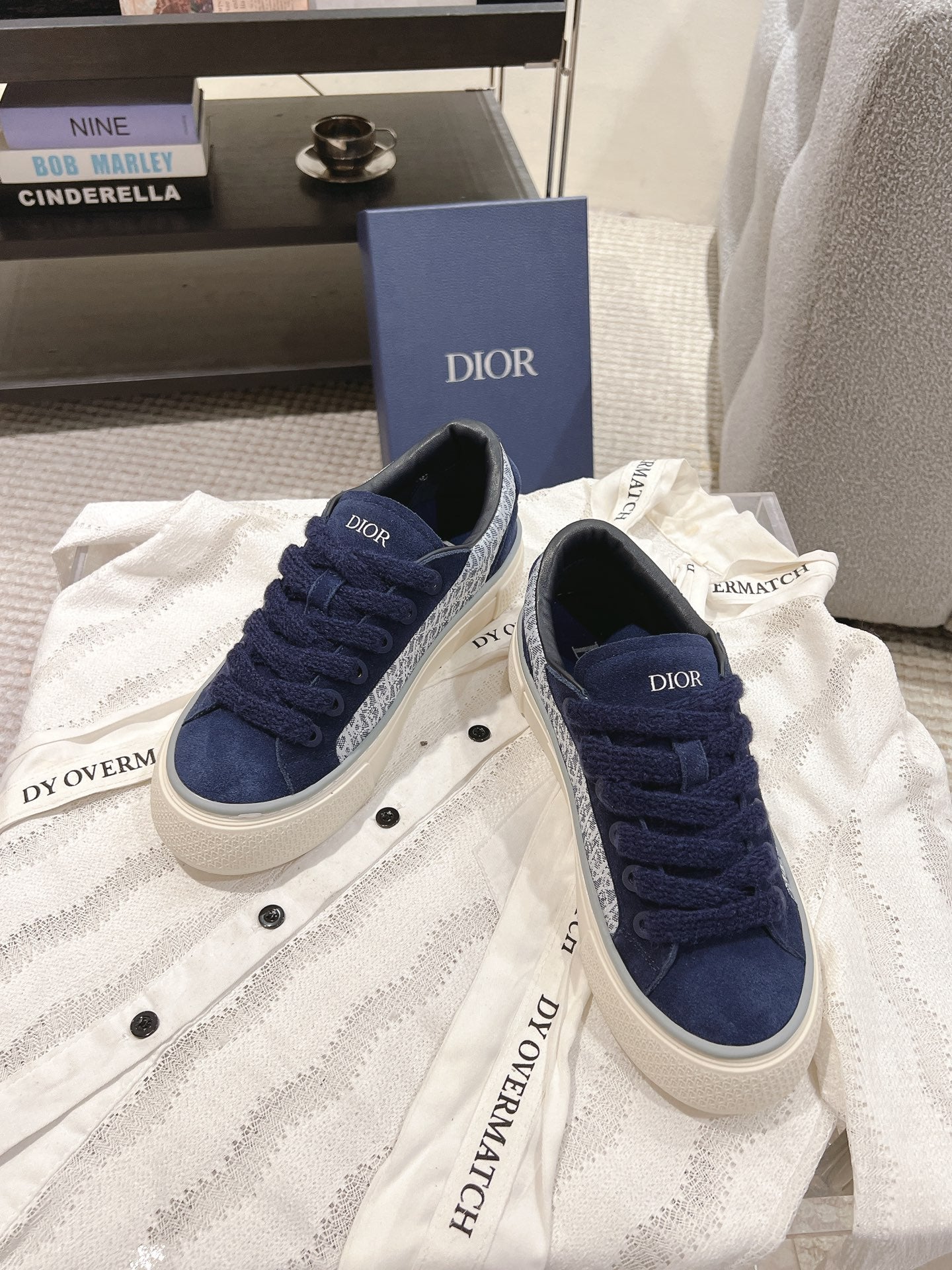 Navy Dior low-top sneakers with fabric laces and white rubber sole