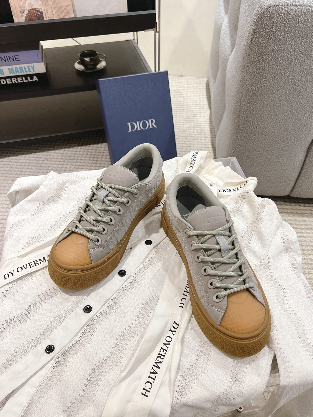 Dior unisex lace-up sneakers, light gray with tan trim and rubber sole