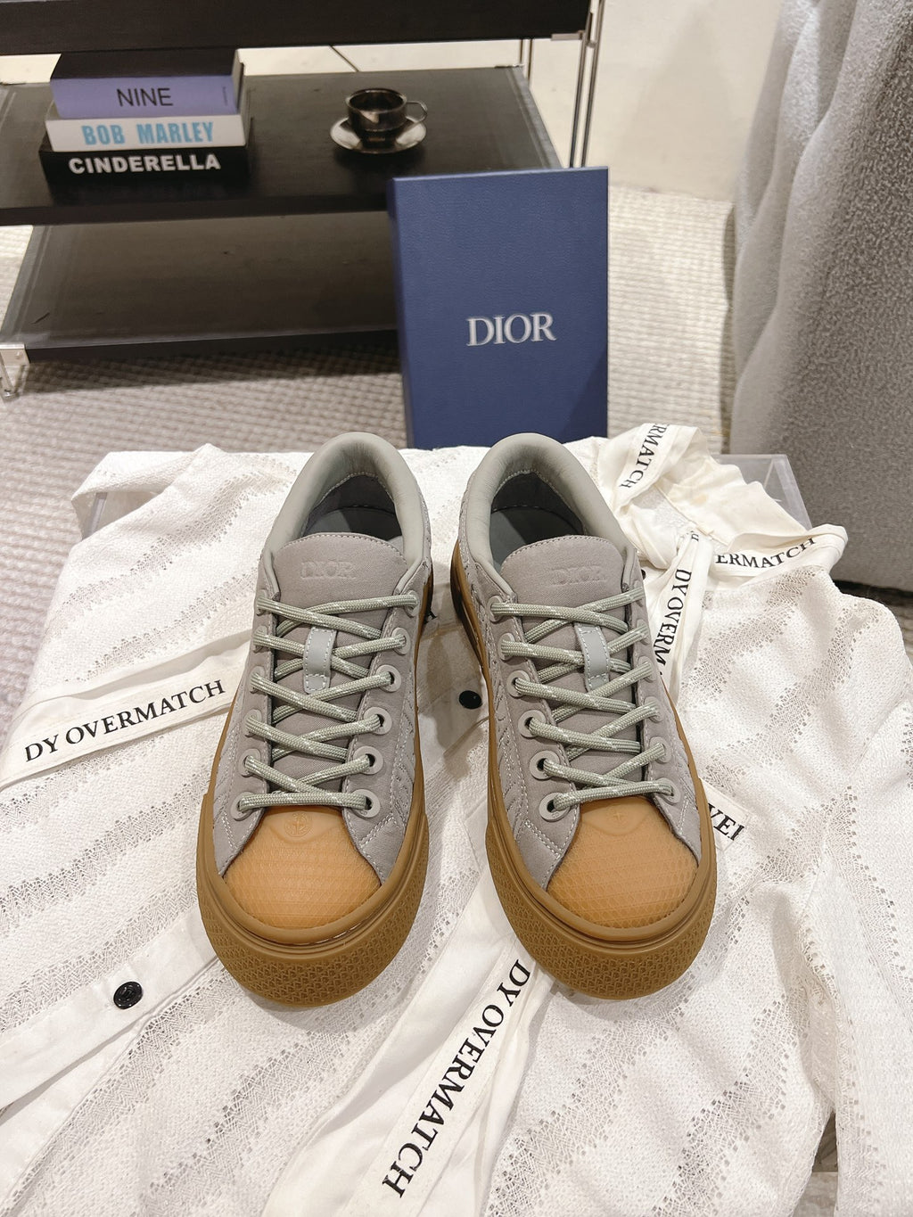Dior unisex sneakers, light gray leather with tan rubber sole and lace-up eyelets