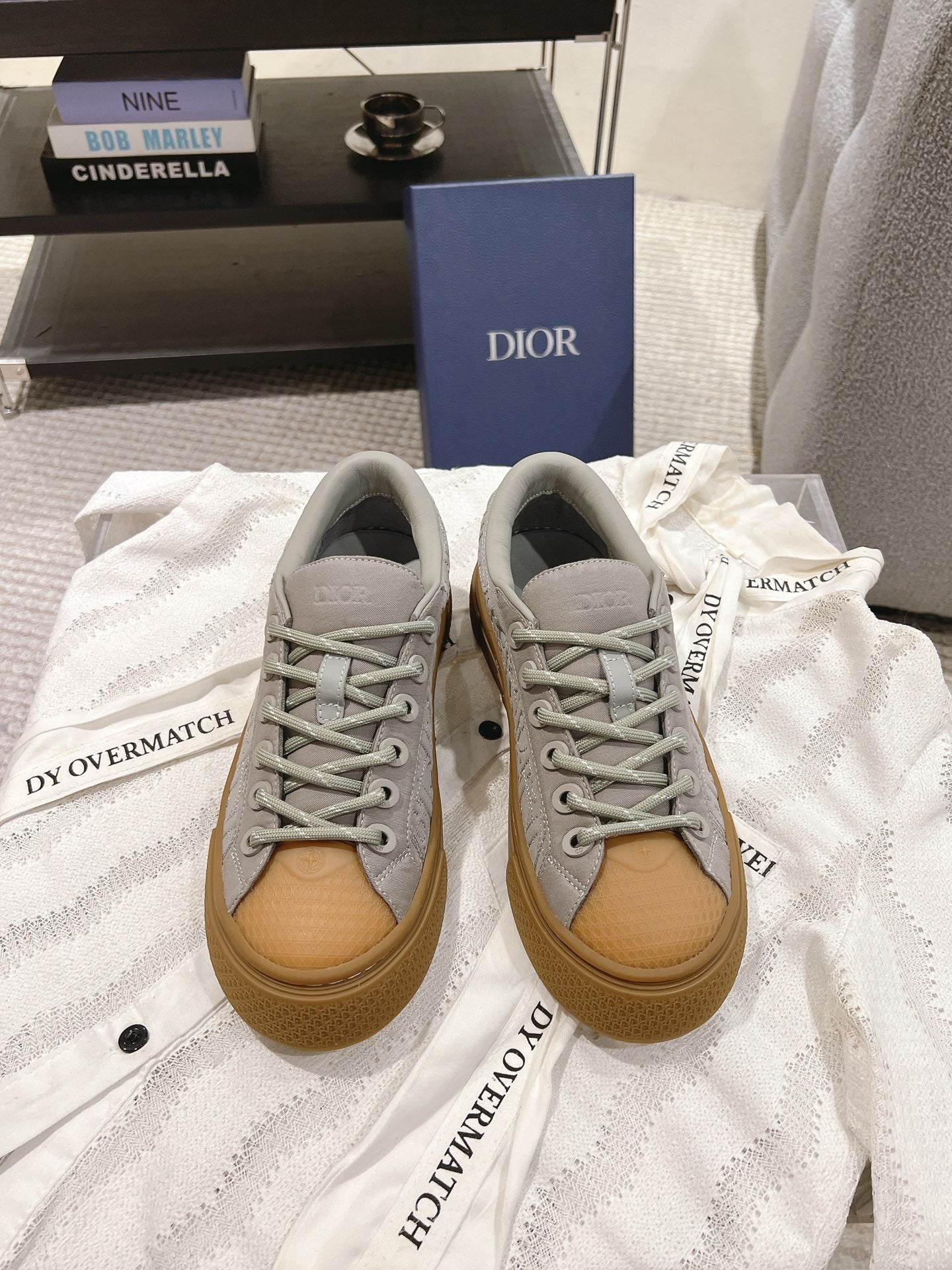 Dior unisex sneakers, light gray leather with tan rubber sole and lace-up eyelets