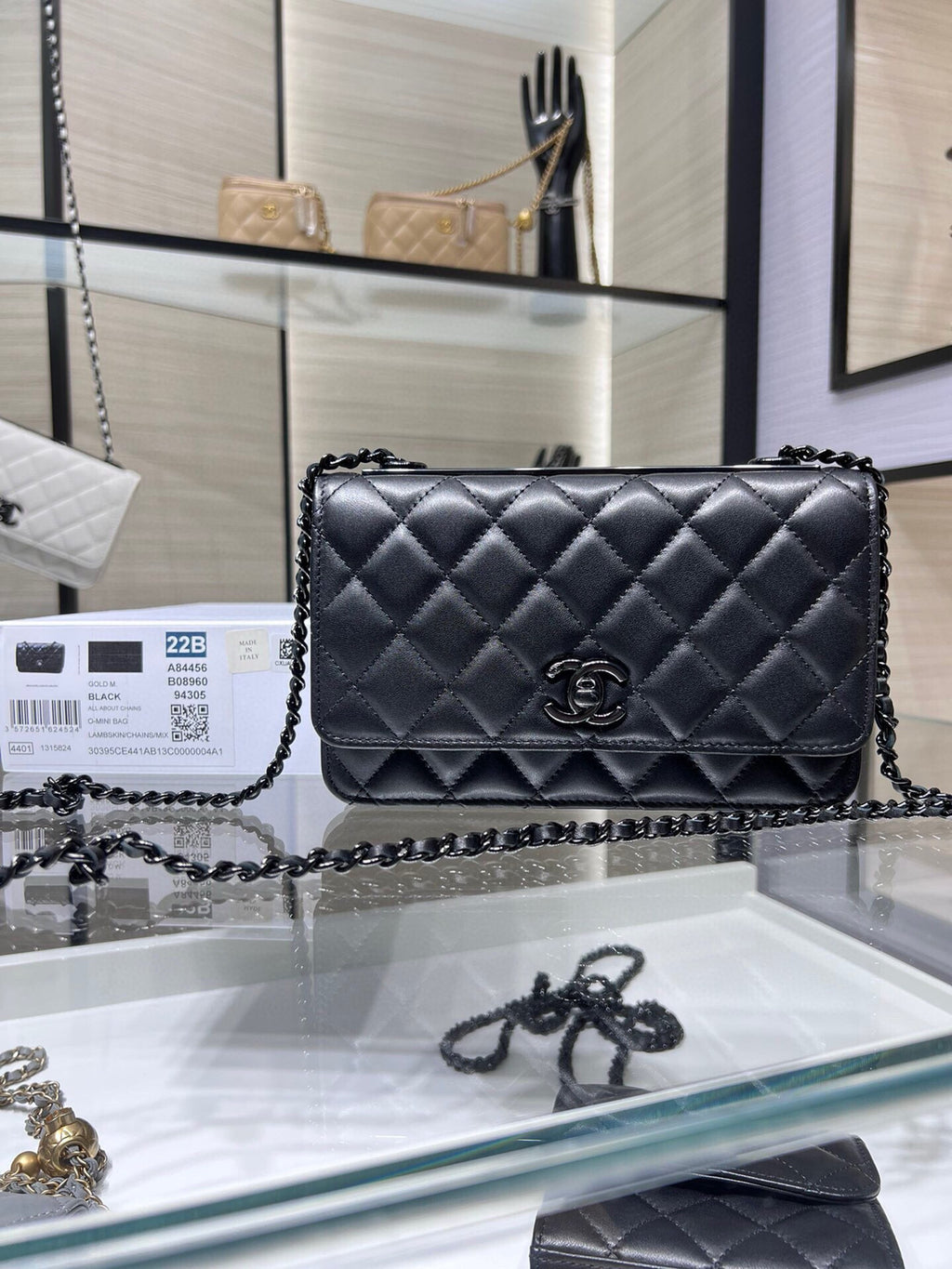 Black quilted leather flap bag with CC logo center and chain shoulder strap