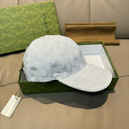 White Gucci monogram baseball cap with curved brim, front view