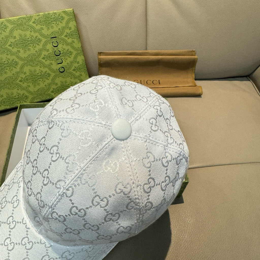 White Gucci monogram baseball cap, top button and crown seam