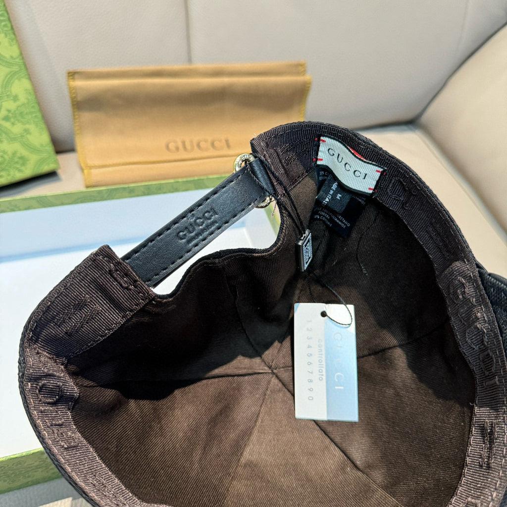 Gucci cap interior with adjustable strap and hang tags.