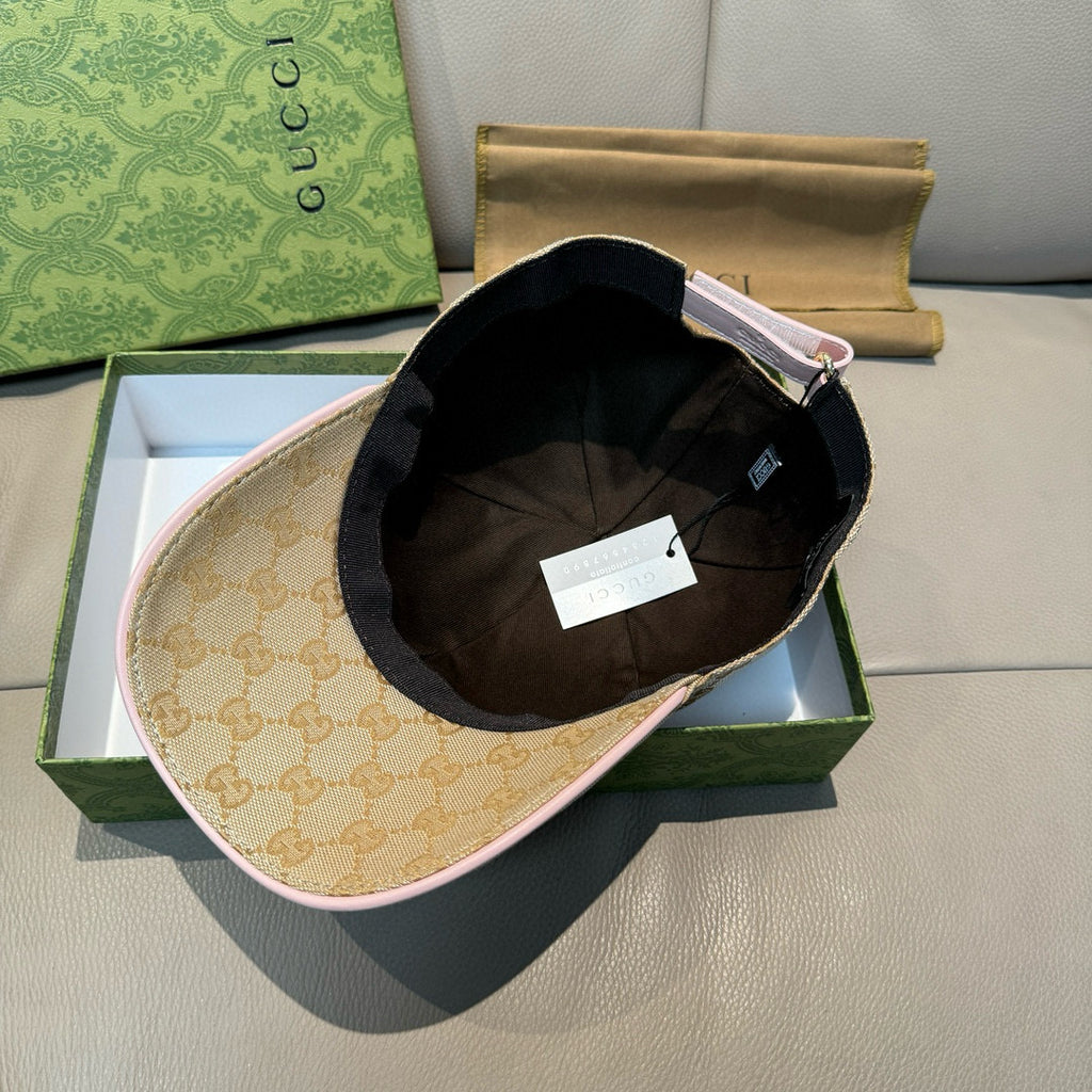 Gucci cap interior with black lining and beige GG monogram underside brim.