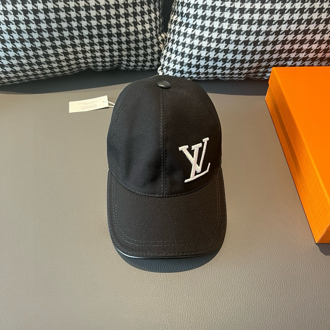 Black Louis Vuitton baseball cap with LV monogram on front panel