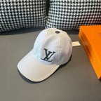Louis Vuitton cap, white with black LV monogram on curved side