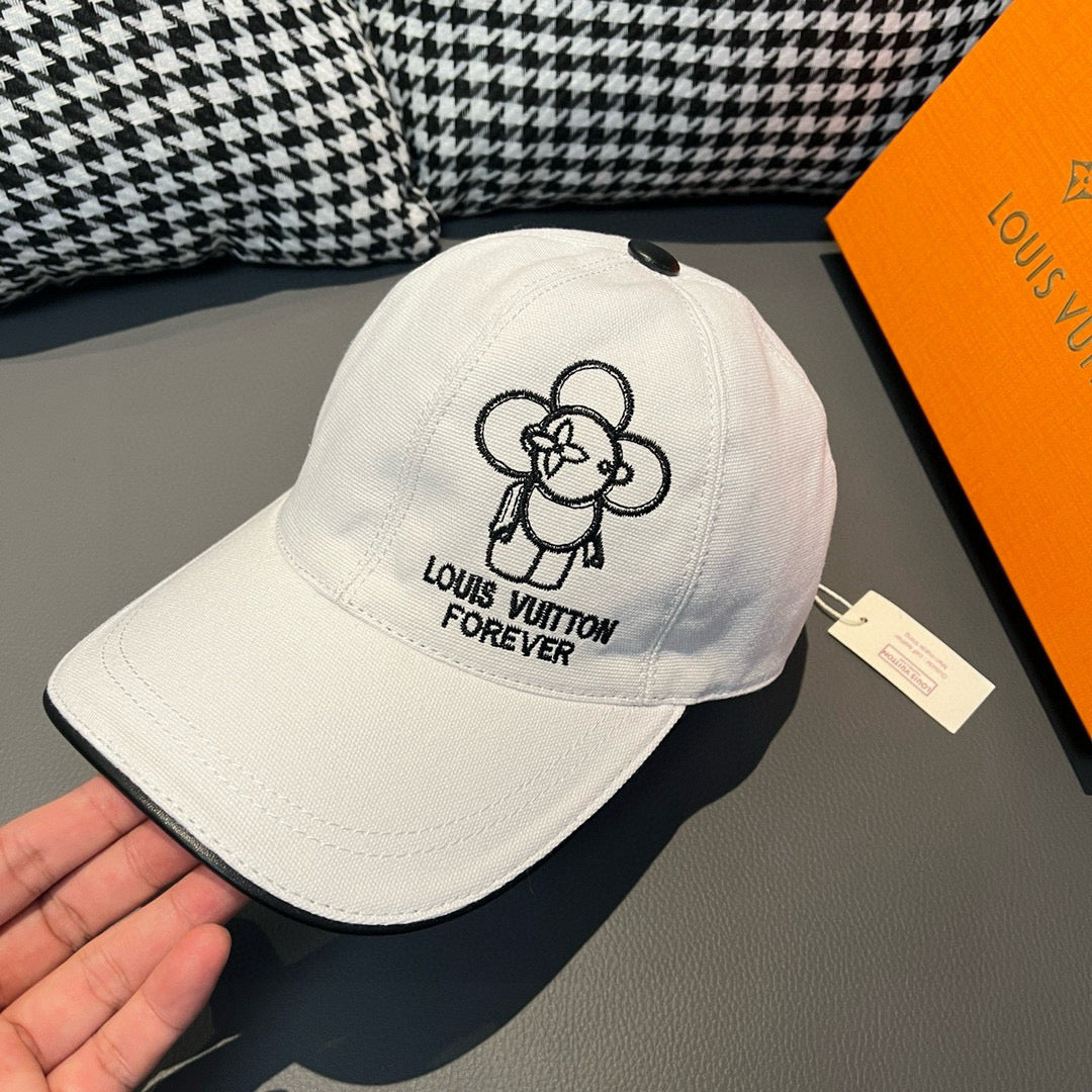 White Louis Vuitton cap with large black dog graphic and "Forever" lettering