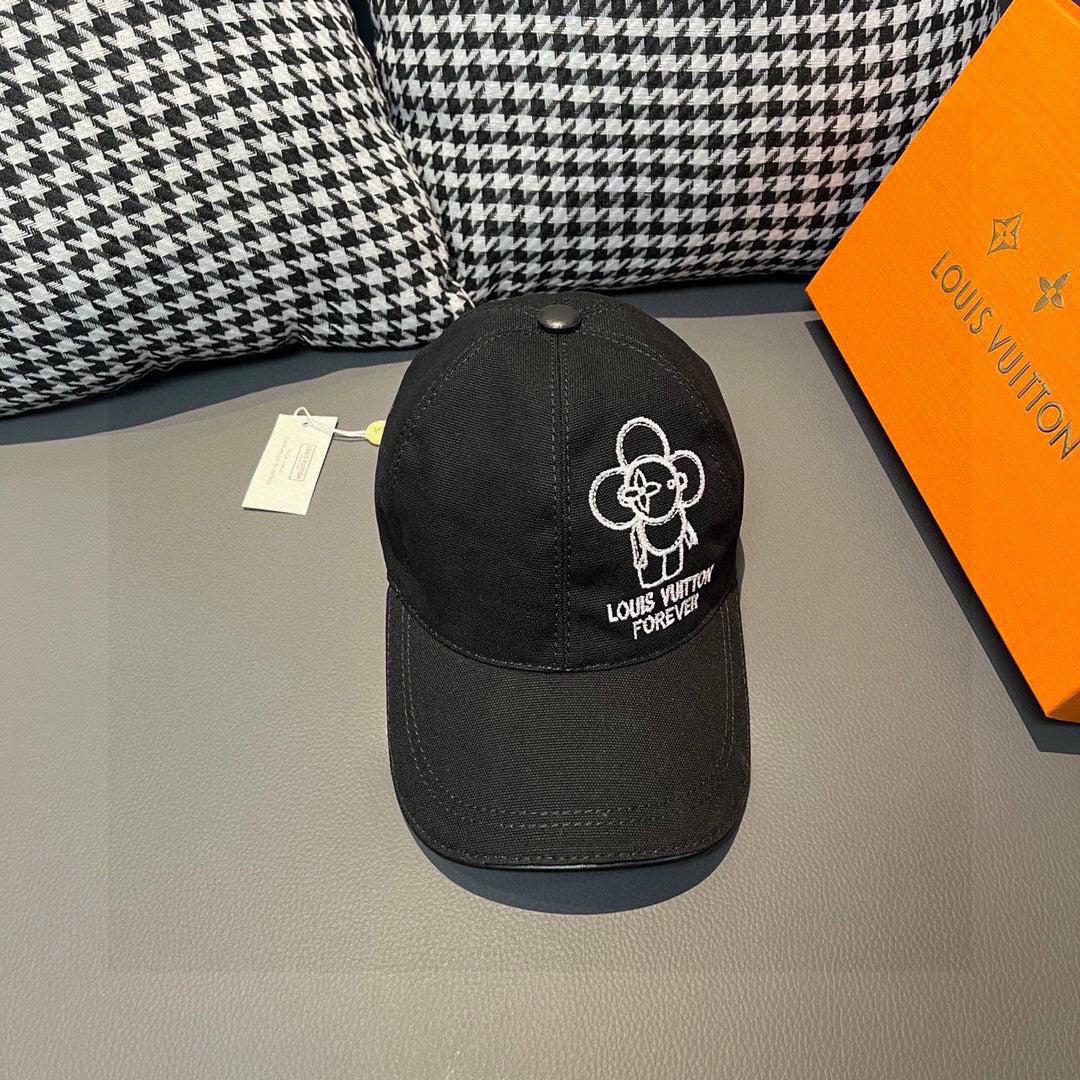 Black Louis Vuitton baseball cap with white embroidered flower logo on the side