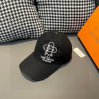 Black Louis Vuitton baseball cap with white embroidered flower logo and Forever text