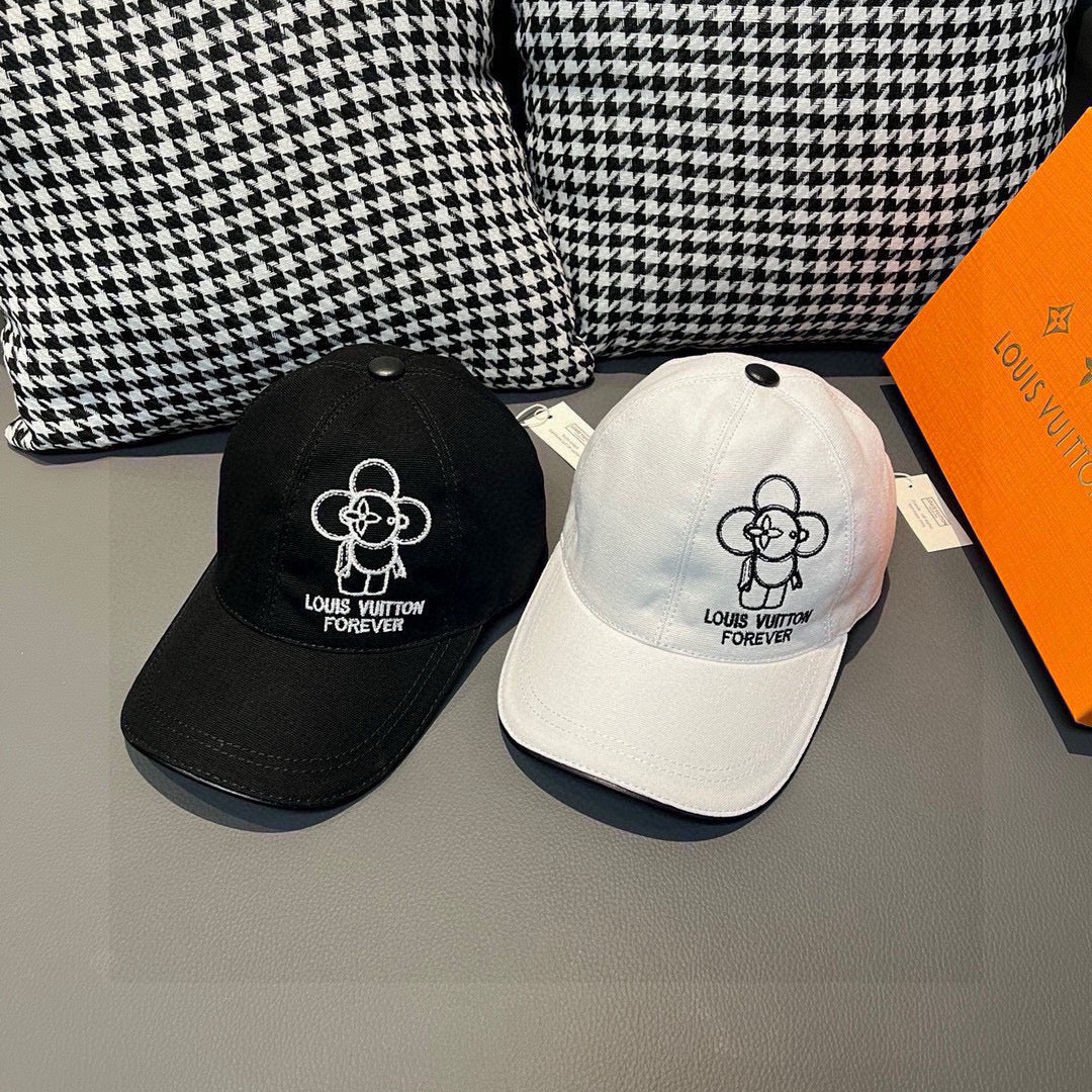Black and white Louis Vuitton baseball caps with white flower logos and Forever text