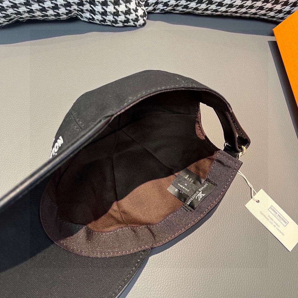 Black Louis Vuitton cap interior view with fabric lining and adjustable strap