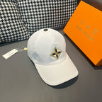 Louis Vuitton white baseball cap with front embroidered star logo and curved brim