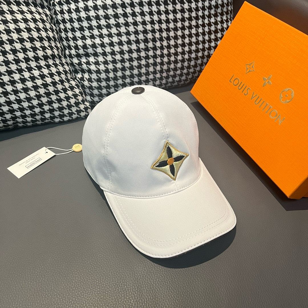 Louis Vuitton white baseball cap with front embroidered star logo and curved brim
