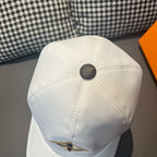 Louis Vuitton white baseball cap with round button at the crown