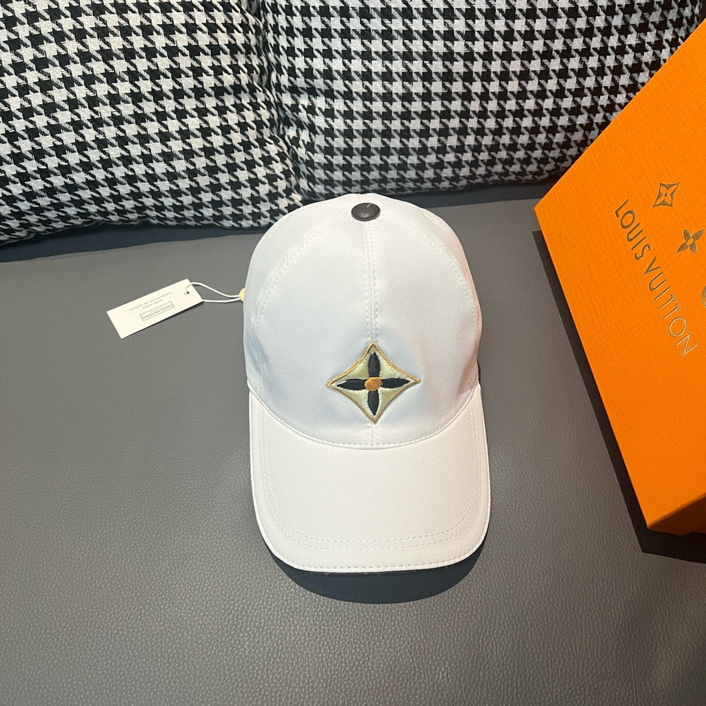 Louis Vuitton white baseball cap with embroidered star emblem on front panel