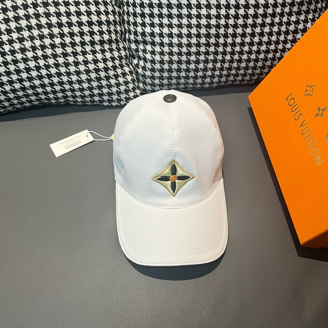 Louis Vuitton white baseball cap with embroidered star emblem on front panel