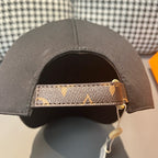 Louis Vuitton cap underside with patterned monogram band and fabric strap.
