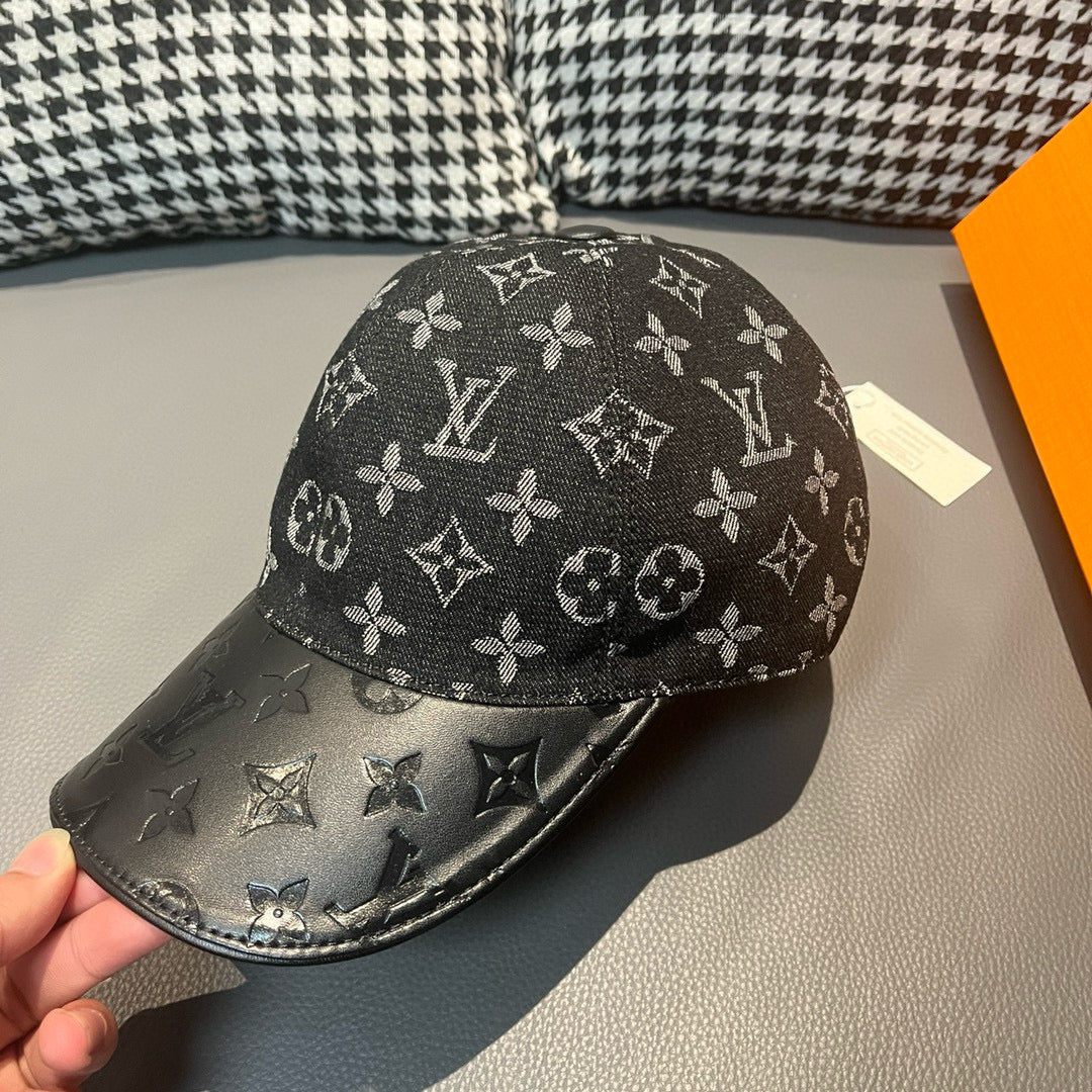 Louis Vuitton monogram baseball cap with dark brim and all-over LV pattern