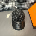 Louis Vuitton monogram baseball cap in dark fabric with repeating LV logos