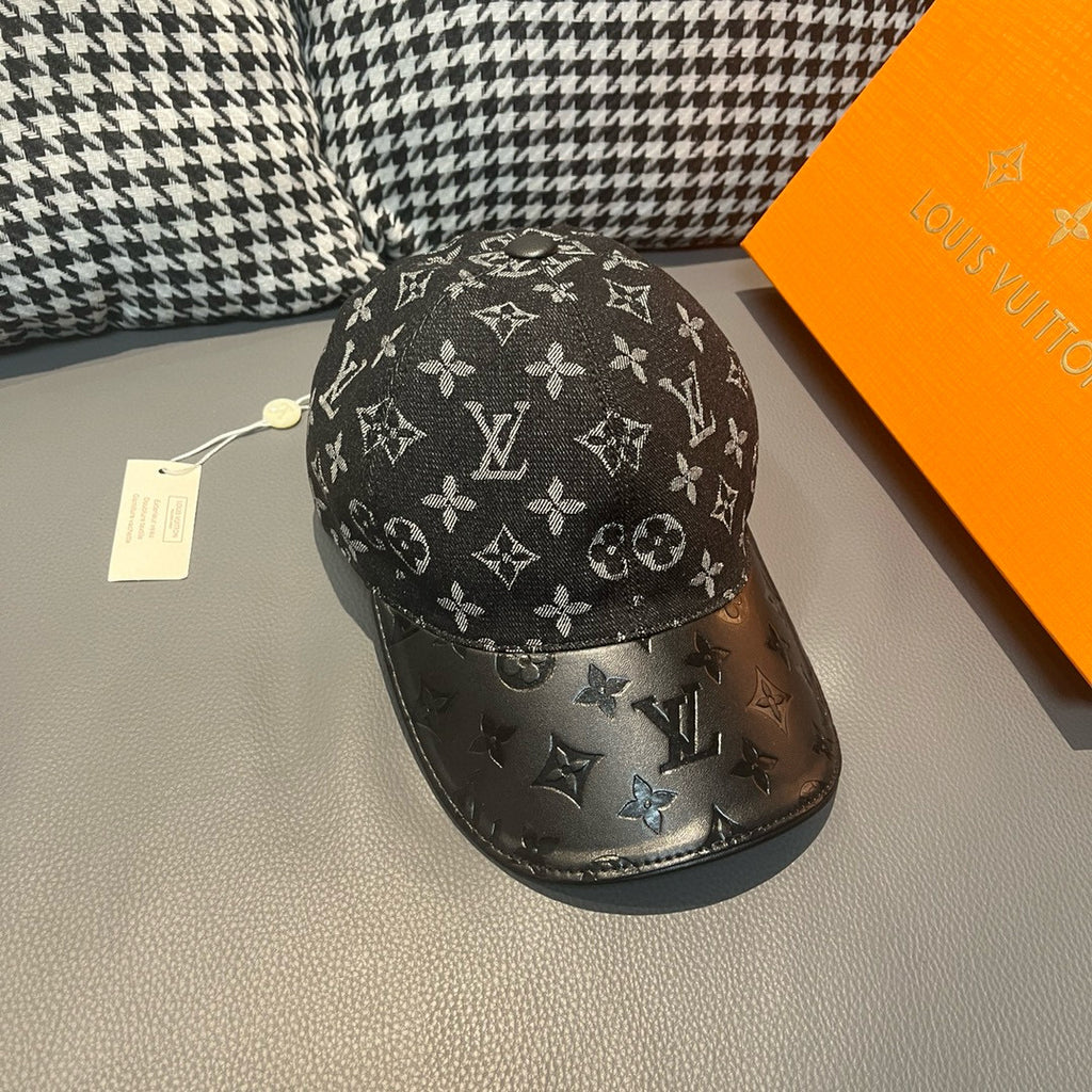 Louis Vuitton monogram baseball cap with dark panels and repeating LV pattern