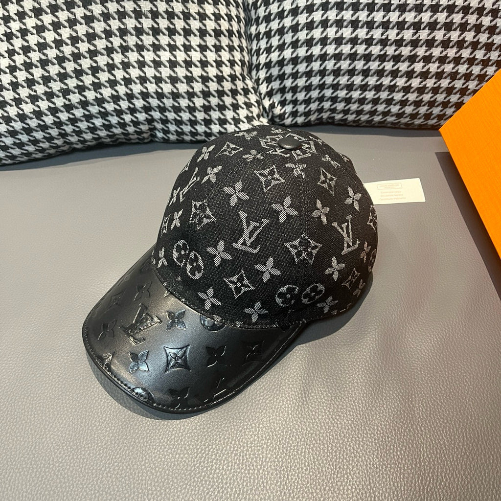 Louis Vuitton monogram baseball cap with dark side panel and repeating LV motifs