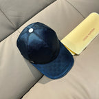Louis Vuitton cap, dark blue with white button detail and curved brim