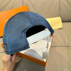 Louis Vuitton cap, dark blue with white-trim side strap and inner label