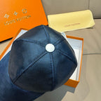 Louis Vuitton cap, dark blue with circular top button and stitched panels