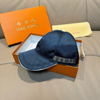 Louis Vuitton cap, dark blue patterned fabric with LV logo on front band