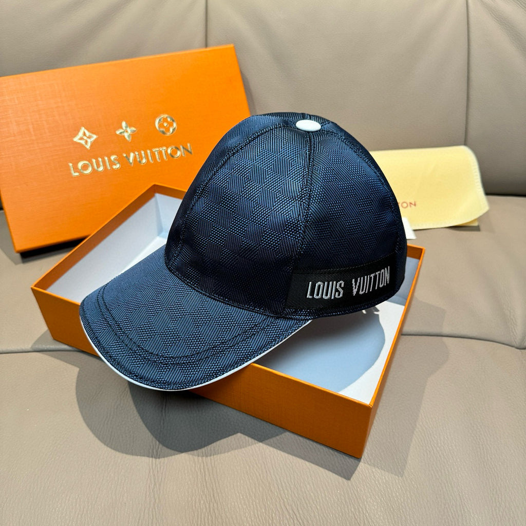 Blue Louis Vuitton baseball cap with front logo patch and curved brim.