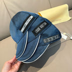 Blue Louis Vuitton baseball cap with adjustable strap and logo patch on side