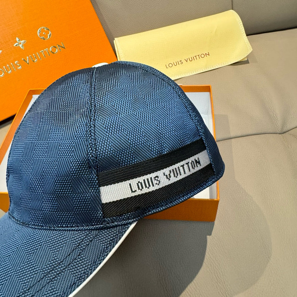 Navy Louis Vuitton cap with front logo strap detail and textured fabric